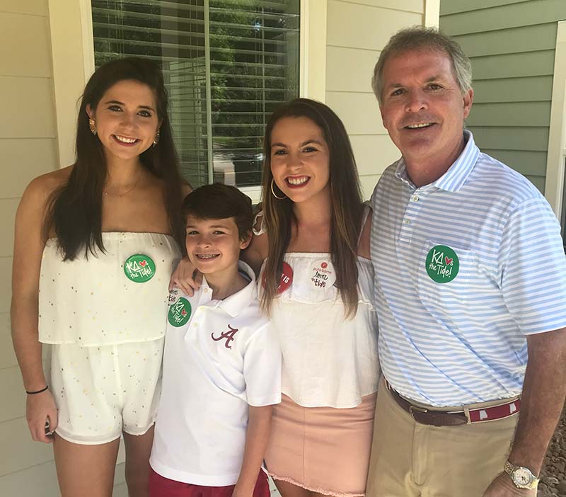 John Longshore with his daughters and son