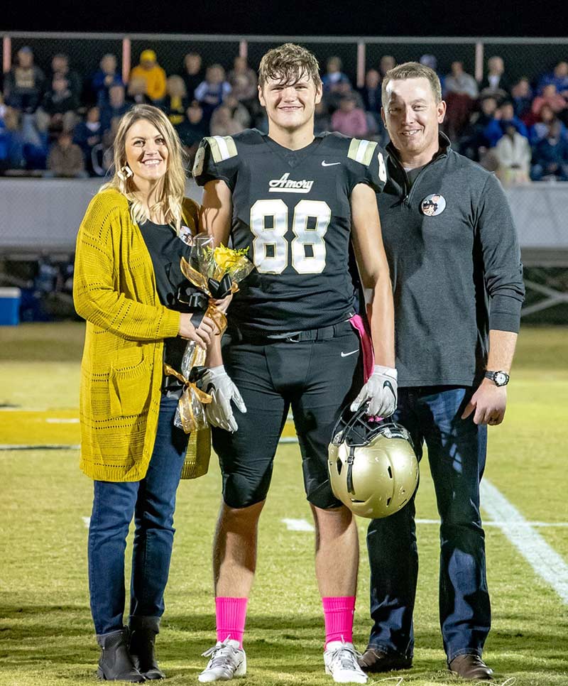 Kevin Carwyle with his wife and son